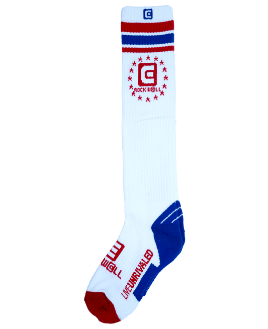 red white and blue old school knee high socks. Rockwell stacked logo on top and on the foot